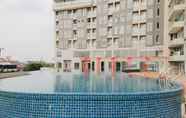 Swimming Pool 6 Modern and Best Deal 2BR Amazana Serpong Apartment By Travelio
