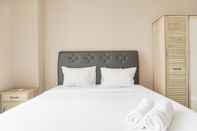 Bedroom Homey and Well Designed 1BR Ciputra International Apartment By Travelio