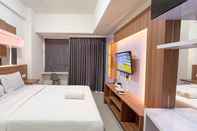 Phòng ngủ Scenic and Cool Studio Apartment Vida View Makassar By Travelio