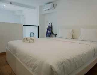 Bedroom 2 Homey and Comfortable Studio Loft at Kingland Avenue Apartment By Travelio
