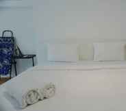 Bedroom 2 Homey and Comfortable Studio Loft at Kingland Avenue Apartment By Travelio