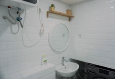 In-room Bathroom 6 Homey and Comfortable Studio Loft at Kingland Avenue Apartment By Travelio