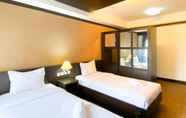 Kamar Tidur 2 Warm and Homey Studio at Metropark Condominium Jababeka Apartment By Travelio