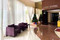 Lobby Warm and Homey Studio at Metropark Condominium Jababeka Apartment By Travelio