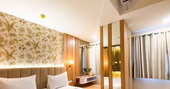 Bedroom Modern Look and Comfy 1BR Gateway Park LRT City Bekasi Apartment By Travelio