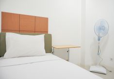 卧室 2 Homey and Gorgeous 2BR Bassura City Apartment near Mall By Travelio