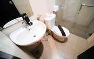 In-room Bathroom 6 Comfy and Best Location 2BR at Tamansari Papilio Apartment By Travelio