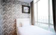 Bedroom 2 Comfy and Best Location 2BR at Tamansari Papilio Apartment By Travelio