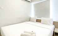 Bedroom 2 Minimalist and Good Deal 1BR at Bassura City Apartment By Travelio