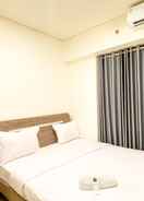 BEDROOM Modern Stay and Tidy 2BR at Meikarta Apartment By Travelio