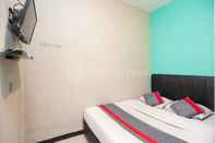 Bedroom J&B Rooms Utan Kayu Jakarta Mitra RedDoorz