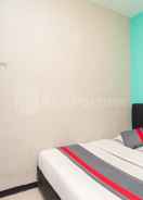 BEDROOM J&B Rooms Utan Kayu Jakarta Mitra RedDoorz