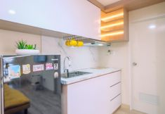 Common Space 6 Spacious and Relaxing 2BR Combined Tokyo Riverside PIK 2 Apartment By Travelio