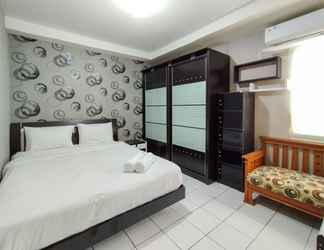 Bedroom 2 Good View and Cool 2BR Apartment at Gateway Ahmad Yani Cicadas By Travelio