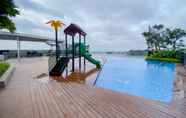 Swimming Pool 5 Cozy Living and Homey Studio Amartha View Apartment By Travelio