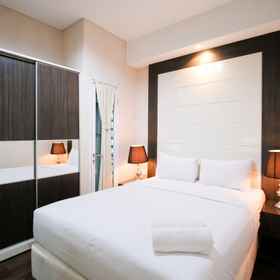 Bedroom 1 Tidy and Best Location 2BR Apartment at Trillium Residence By Travelio, Grahadi Building Hotels