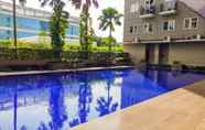 Swimming Pool 5 Comfy and Relaxing Studio Sunter Park View Apartment By Travelio