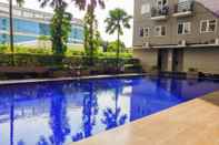 Swimming Pool Comfy and Relaxing Studio Sunter Park View Apartment By Travelio