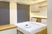 Kamar Tidur Cozy and Nice Studio at Pollux Chadstone Apartment By Travelio