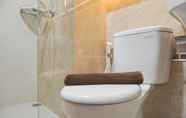 In-room Bathroom 6 Minimalist and Warm Studio Transpark Bintaro Apartment By Travelio