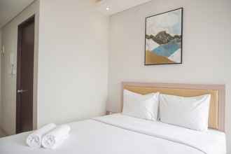 Kamar Tidur 4 Minimalist and Warm Studio Transpark Bintaro Apartment By Travelio