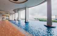Swimming Pool 7 Minimalist and Warm Studio Transpark Bintaro Apartment By Travelio
