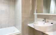 In-room Bathroom 7 Relaxing and Comfy Studio at Vasanta Innopark Apartment By Travelio