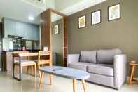 Lobby Homey and Good 1BR Apartment at Mustika Golf Residence By Travelio