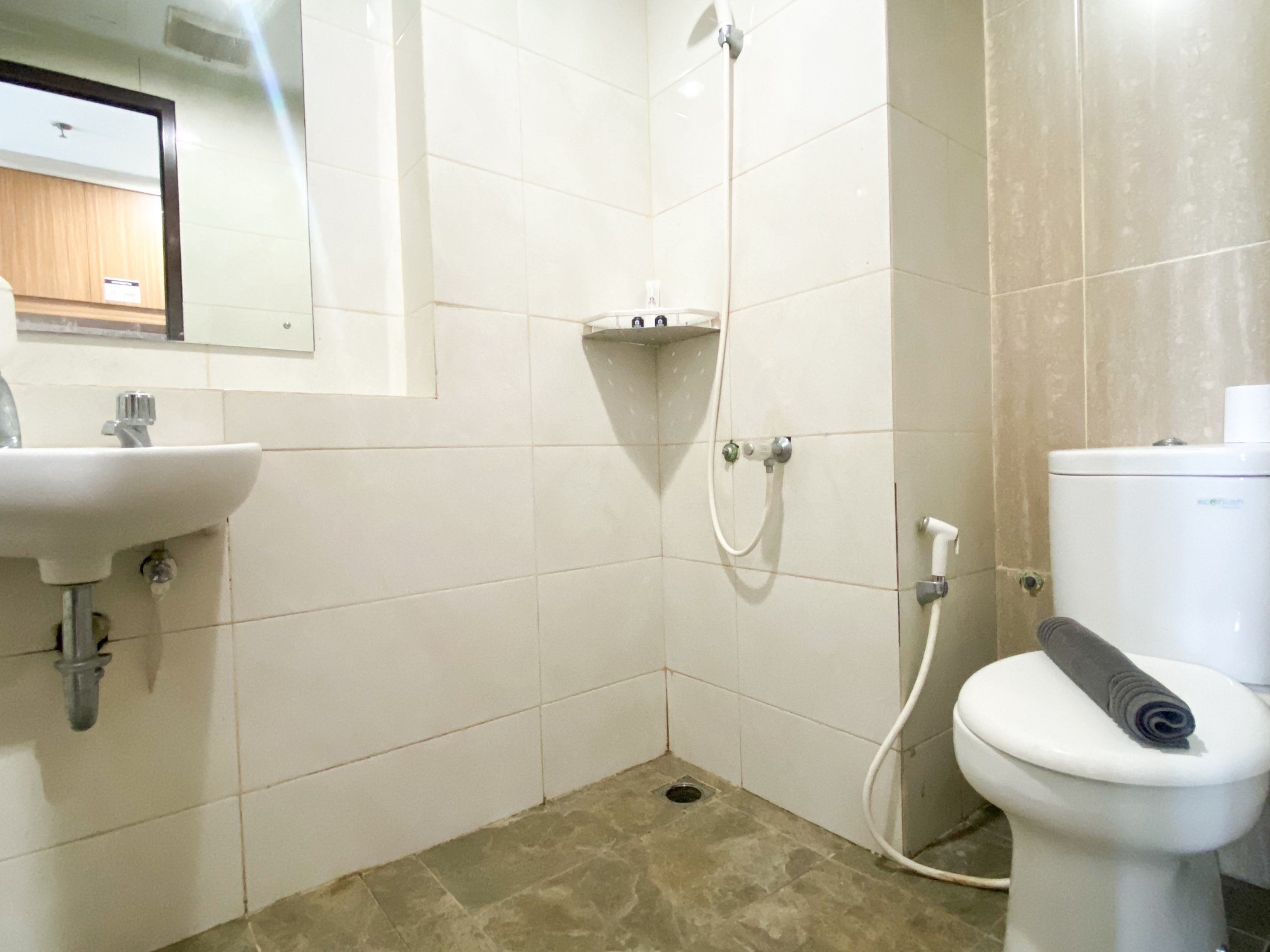 In-room Bathroom 5 Simply Look and Tidy Studio at Grand Dhika City Apartment By Travelio