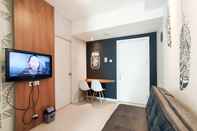 Common Space Stylish and Convenient 1BR Apartment Parahyangan Residence By Travelio