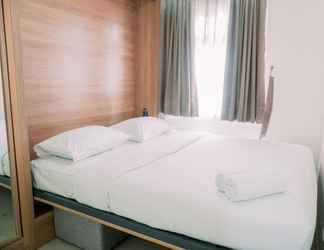 Bedroom 2 Comfort and Best Deal 2BR Green Pramuka City Apartment By Travelio