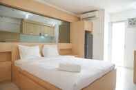 Bedroom Homey and Good Deal Studio Bassura City Apartment By Travelio