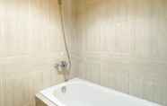 In-room Bathroom 6 Modern Look and Calm 1BR Vasanta Innopark Apartment By Travelio