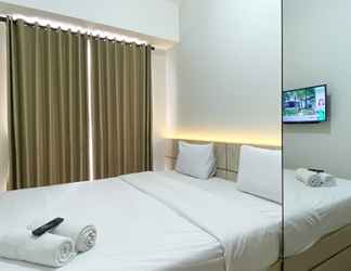 Bilik Tidur 2 Modern Look and Calm 1BR Vasanta Innopark Apartment By Travelio