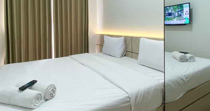Bedroom Modern Look and Calm 1BR Vasanta Innopark Apartment By Travelio