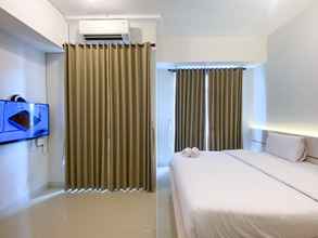 Bedroom 4 Comfort and Enjoy Studio Vasanta Innopark Apartment By Travelio