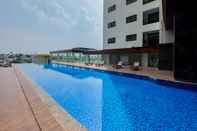 Swimming Pool Homey and Good Deal Studio Apartment Anwa Residence Bintaro By Travelio