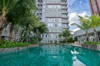 Kolam Renang Best Price and Cozy 2BR Apartment Vida View Makassar By Travelio