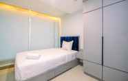 Kamar Tidur 2 Cozy and Good Choice 2BR Grand Kamala Lagoon Apartment By Travelio