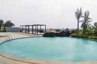 Kolam Renang Cozy and Good Choice 2BR Grand Kamala Lagoon Apartment By Travelio