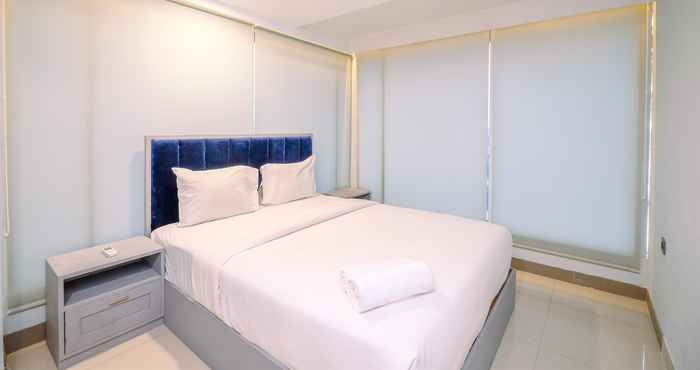 Kamar Tidur Cozy and Good Choice 2BR Grand Kamala Lagoon Apartment By Travelio