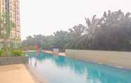 Swimming Pool 7 Restful and Good Choice Studio at Transpark Cibubur Apartment near Mall By Travelio