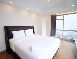 Bedroom 2 Clean and Homey 2BR at Grand Sungkono Lagoon Apartment By Travelio