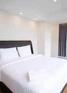 BEDROOM Clean and Homey 2BR at Grand Sungkono Lagoon Apartment By Travelio