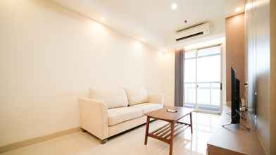 Common Space 4 Clean and Homey 2BR at Grand Sungkono Lagoon Apartment By Travelio