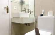 In-room Bathroom 7 Modern and Good 2BR Daan Mogot City Apartment By Travelio