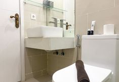 In-room Bathroom 7 Modern and Good 2BR Daan Mogot City Apartment By Travelio