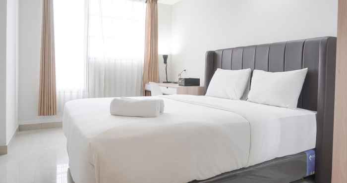 Bedroom Comfy and Good Look Studio Apartment at Evenciio Margonda By Travelio
