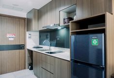 Common Space 6 Comfortable and Homey 1BR at The Smith Alam Sutera Apartment By Travelio