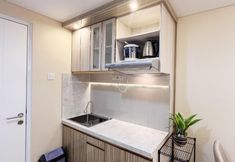 Common Space 6 Homey and Good Deal 1BR Tamansari Skylounge Makassar Apartment By Travelio